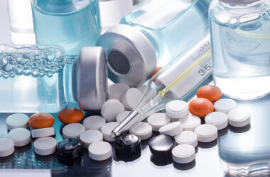 a variety of pills, vials and pill bottles
