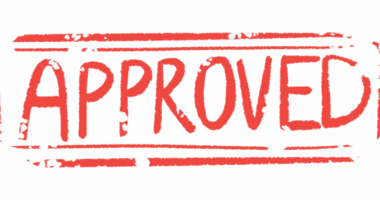 A rubber stamp shows the word 'approved' in all capital, red letters.