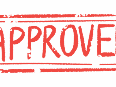 A rubber stamp shows the word 'approved' in all capital, red letters.