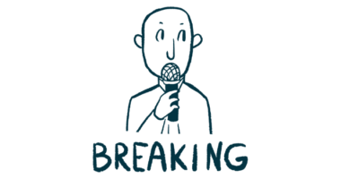 A person speaks using a microphone, with the word 'breaking' in capital letters seen underneath.