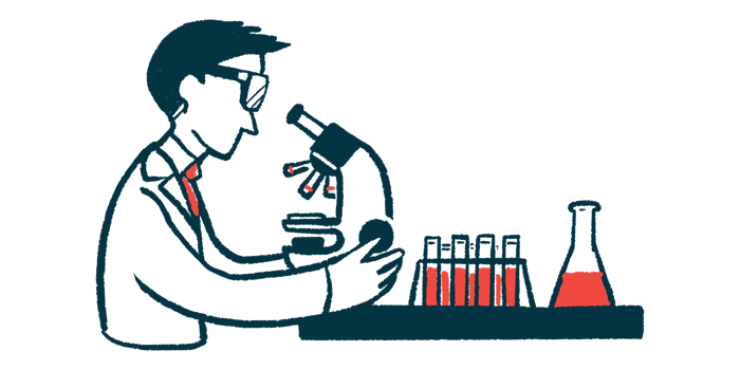 A researcher views slides through a microscope.
