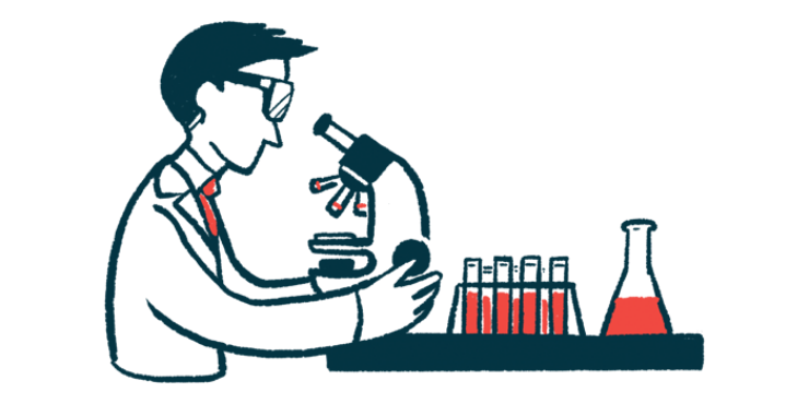 A researcher wearing safety goggles examines a sample using a microscope, alongside a rack of filled vials and a flask.