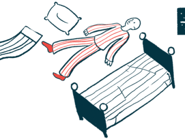 A person wearing pajamas lies wide awake on the floor next to a bed at nighttime.