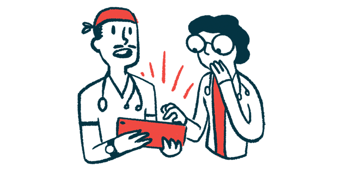 Two doctors view information on a tablet held by one of them.