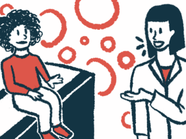 A clinician speaks to a child seated on an examination table.