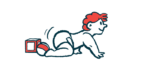 A baby is shown crawling away from a pair of blocks.