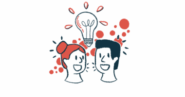 A giant light bulb suggesting new ideas is seen above the heads of two people.