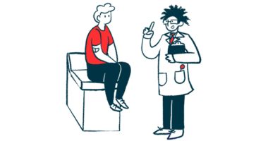 A doctor talks to a patient who is sitting on an exam table.