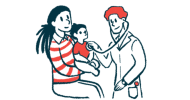 A child sits on a woman's lap while being examined by a doctor.