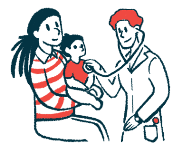 A child sits on a woman's lap while being examined by a doctor.